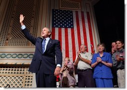 President George W. Bush waves to the crowd during his introduction at the Stockton Memorial Auditorium in Stockton, Calif., Friday, Aug. 23. White House photo by Eric Draper.