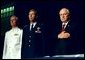 Vice President Dick Cheney Vice stands at attention with Vice Admiral John Totushek, left, and General Donald Cook, center, during the National Anthem moments before addressing veterans of the Korean War in San Antonio, TX Aug. 29, 2002. 