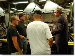 President George W. Bush tours the Sears Manufacturing Company in Davenport , Iowa on Monday, September 16, 2002. White House photo by Tina Hager.