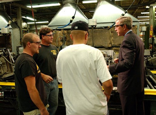 President George W. Bush tours the Sears Manufacturing Company in Davenport , Iowa on Monday, September 16, 2002. 