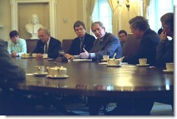 President George W. Bush meets with members of Congress in the Cabinet Room of the White House on Wednesday, September 18, 2002, to talk about Iraq. White House photo by Tina Hager.