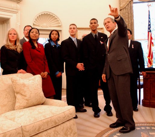 President George W. Bush talks with members of the Boys and Girls Club of America Youths of the Year in the Oval Office Wednesday, September 25, 2002. Donald Smith, (second from right) a 12-year member of Boys and Girls Clubs of the East Valley in Tempe, Ariz., was named National Youth of the Year by Boys & Girls Clubs of America at a Congressional Breakfast this morning. White House photo by Eric Draper.