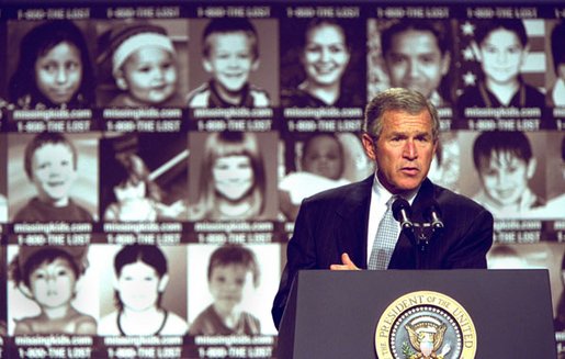 President George W. Bush addresses participants in the first-ever White House Conference on Missing, Exploited, and Runaway Children Wednesday, October 2,2002 at the Ronald Reagan Building and International Conference Center in Washington, D.C. The event helped raise public awareness of steps that parents, law enforcement, and communities can take to make America's children safer. White House photo by Paul Morse.