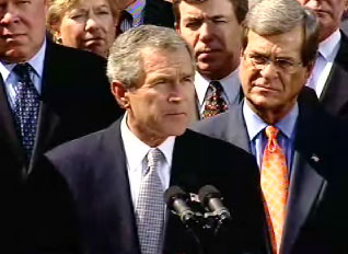President Bush is joined by House and Senate leaders on Wednesday to announce an agreement with the House on the Iraq resolution. Video screen capture by Monty Haymes.