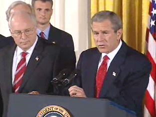 President Bush Wednesday signed the Iraq resolution stating, "We will defend our nation and lead others in defending the peace." White House screen capture.