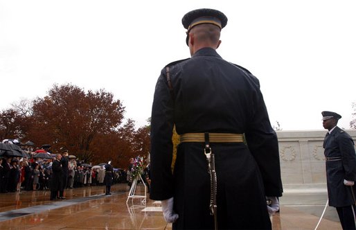 The President takes part in a wreath laying ceremony to commemorate Veterans Day at Arlington National Cemetery on Monday November 11, 2002 White House photo by Paul Morse