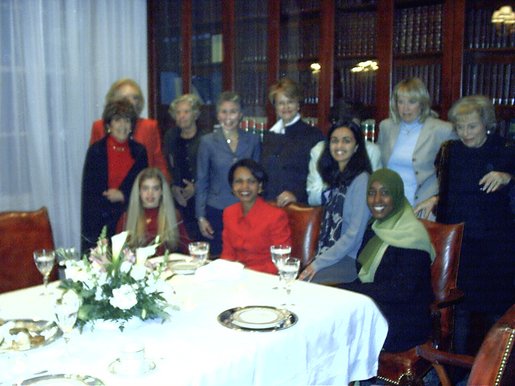 National Security Advisor Condoleeza Rice takes a group photo at the Karamah Iftaar Dinner.