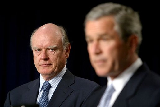 John Snow, who is nominated to be the Secretary of Treasury, listens to President George W. Bush's remarks in the Dwight D. Eisenhower Executive Office Building Monday, Dec. 9. "In a varied and productive career, John Snow has shown consistent qualities of foresight and integrity and public spirit. He's led one our nation's largest railroads with skill and success. He knows firsthand how the economy works. His peers elected him to lead the Business Roundtable, where he was an articulate voice for pro-growth policies," said the President. White House photo by Paul Morse