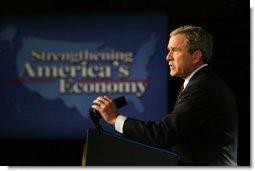 President George W. Bush speaks to the Economic Club of Chicago, Ill., about his growth and jobs plan to strengthen the American economy Tuesday, January 7, 2003.  White House photo by Paul Morse