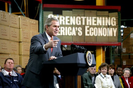 President George W. Bush talks with owners and employees of JS Logistics in St. Louis, Mo., about his economic stimulus package Wednesday, Jan. 22, 2003. White House photo by Paul Morse