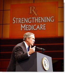 President George W. Bush addresses the audience at Devos Performance Hall in Grand Rapids, Mich., Wednesday, Jan. 29, 2003. "I urged the Congress last night to put aside all the politics and to make sure the Medicare system fulfills its promise to our seniors," President Bush said. "I believe that seniors, if they're happy with the current Medicare system, should stay on the current Medicare system. That makes sense. If you like the way things are, you shouldn't change. However, Medicare must be more flexible. Medicare must include prescription drugs."  White House photo by Tina Hager