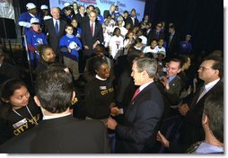On the first anniversary of President George W. Bush's USA Freedom Corps initiative, the President visits the Jelleff Branch of the Boys & Girls Club of Greater Washington in the District of Columbia Thursday, Jan. 30. "Once again, I'm asking our fellow citizens to serve your community and to serve your country by finding a program that will make a difference in somebody's lives. It doesn't matter how big or small the program may sound. What matters is your love and your energy and your participation," said the President in his remarks.  White House photo by Tina Hager