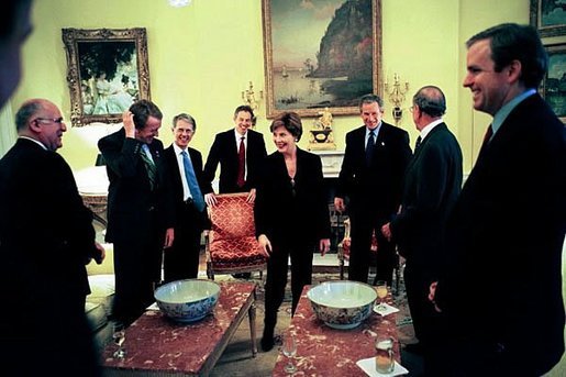 Laura Bush greets participants in a meeting between President George W. Bush and British Prime Minister Tony Blair in the White House residence, Jan. 31, 2003. White House photo by Eric Draper