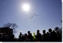 Honoring the seven astronauts who died in the Space Shuttle Columbia disaster, jets fly over the crowd in a missing man formation during a memorial service at the NASA Lyndon B. Johnson Space Center Tuesday, Feb. 4, 2003.  White House photo by Paul Morse