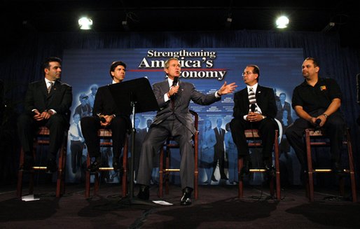 President George W. Bush leads the discussion during a forum with small business owners and employees at Dagher Printing in Jacksonville, Fla., Thursday, Feb. 13, 2003. Also pictured, from left, are: Hector Barreto, Administrator of the Small Business Administration; Zimmerman Boulos, owner of Office Environments and Services; Joseph Dagher, owner of Dagher Printing and Jose Gonzalez, employee at Office Environments and Services. White House photo by Eric Draper