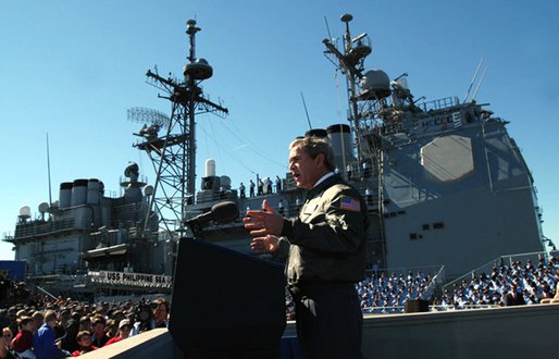  President George W. Bush speaks to sailors in front of the USS Philippine Sea at Naval Station Mayport in Mayport, Fla., Thursday, Feb. 13, 2003. White House photo by Eric Draper