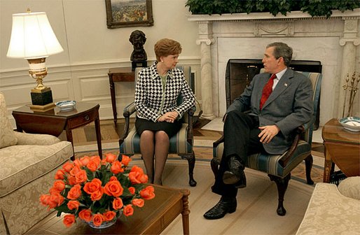 President George W. Bush hosts a visit by Latvian President Vaira Vike-Freiberga in the Oval Office on Presidents' Day, Monday, Feb. 17, 2003. White House photo by Tina Hager
