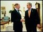 President George W. Bush welcomes Simeon Saxe-Coburg Gotha, Prime Minister of the Republic of Bulgaria, to the Oval Office Tuesday, Feb. 25, 2003. White House photo by Eric Draper.