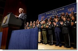 President George W. Bush delivers remarks to new employees of the U.S. Department of Homeland Security at the Ronald Reagan Building and International Trade Center in Washington, D.C., Friday, Feb. 28, 2003.   White House photo by Paul Morse
