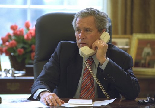 President George W. Bush talks to British Prime Minister Tony Blair from the Oval Office Friday afternoon, March 7, 2003. White House photo by Eric Draper.