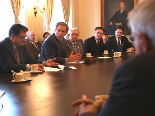 President George W. Bush hosts a meeting on medical liability with bipartisan members of Congress in the Cabinet Room Wednesday, March 12, 2003. The president is joined, from left, by Rep. W.J. 'Billy' Tauzin (R-La), and Rep. Jim Greenwood (R-Pa.), Rep. Dennis Cardoza (D-Ca.) and Rep. Michael Turner (R-Ohio). White House photo by Tina Hager