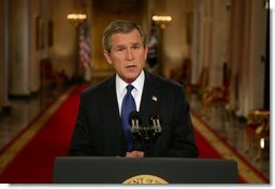 President George W. Bush addresses the nation from the Cross Hall at the White House Monday evening, March 17, 2003.   White House photo by Paul Morse