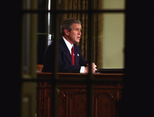 President George W. Bush addresses the nation from the Oval Office at the White House Wednesday evening, March 19, 2003. White House photo by Paul Morse