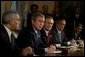 President George W. Bush meets with his Cabinet the day after beginning the disarmament of Iraq in the Cabinet Room Thursday, March 20, 2003. Pictured with the President are, from left, State Secretary Colin Powell, Defense Secretary Donald Rumsfeld, Commerce Secretary Don Evans and Transportation Secretary Norman Mineta.  White House photo by Paul Morse