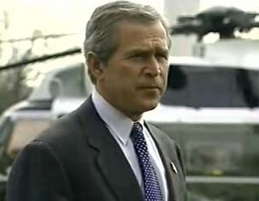 President George W. Bush speaks to reporters as he returns from Camp David. White House screen capture.