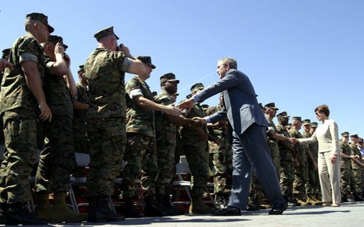 President George W. Bush and Mrs. Bush greet Marines at Camp Lejeune in Jacksonville, N.C., Thursday, April 3, 2003. White House photo by Paul Morse