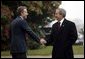 President George W. Bush is greeted by British Prime Minister Tony Blair at Hillsborough Castle near Belfast, Ireland, April 7, 2003. White House photo by Paul Morse.