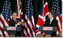 President George W. Bush and British Prime Minister Tony Blair hold a joint press conference at Hillsborough Castle near Belfast, Northern Ireland, Tuesday, April 8, 2003.   White House photo by Paul Morse