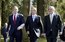 President George W. Bush walks with British Prime Minister Tony Blair, center, and Irish Prime Minister Bertie Ahern at Hillsborough Castle as he prepares to depart Northern Ireland Tuesday, April 8, 2003. White House photo by Paul Morse 