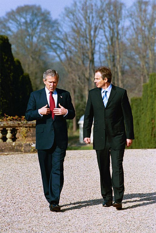 President Bush and Prime Minister Tony Blair of Great Britain walk on the grounds at Hillsborough Castle. Hillsborough, Northern Ireland, April 8, 2003. White House photo by Eric Draper.
