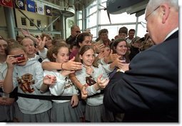 Vice President Dick Cheney shakes hands with students in New Orleans, La., after touring the National D-Day Museum with his wife Lynne Wednesday, April 9, 2003.  White House photo by David Bohrer