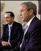 President George W. Bush and President of Colombia Alvaro Uribe take questions from the press in the Oval Office Wednesday, April 30, 2003. White House photo by Tina Hager