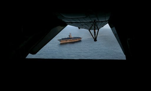 The USS Abraham Lincoln as seen from the air off the coast of San Diego, California after the President addressed the nation May 1, 2003. White House photo by Paul Morse