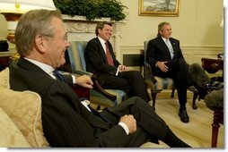 During a meeting with Secretary of Defense Donald Rumsfeld, President George W. Bush announces L. Paul Bremer, center, as the presidential envoy to Iraq in the Oval Office Tuesday, May 6, 2003. "He's a man of enormous experience; a person who knows how to get things done; he's a can-do type person," said the President of the former ambassador.  White House photo by Paul Morse