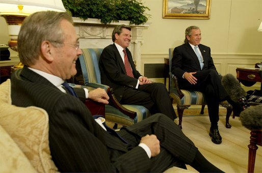 During a meeting with Secretary of Defense Donald Rumsfeld, President George W. Bush announces L. Paul Bremer, center, as the presidential envoy to Iraq in the Oval Office Tuesday, May 6, 2003. "He's a man of enormous experience; a person who knows how to get things done; he's a can-do type person," said the President of the former ambassador. White House photo by Paul Morse