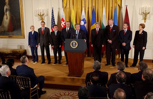 President George W. Bush addresses the Central European Foreign Ministers in the East Room May 8, 2003. "Just hours ago, the United States Senate voted unanimously to support NATO admission for Bulgaria, Estonia, Latvia, Lithuania, Romania, Slovakia and Slovenia," explained President Bush. "These heroic nations have survived tyranny, they have won their liberty and earned their place among free nations. America has always considered them friends, and we will always be proud to call them allies." White House photo by Tina Hager.