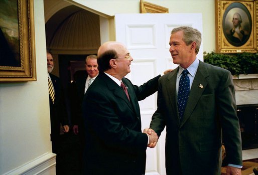 President George W. Bush meets with President Hipolito Mejia of the Dominican Republic in the Oval Office Tuesday, May 20, 2003. White House photo by Eric Draper.