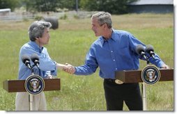 President George W. Bush and Japanese Prime Minister Junichiro Koizumi shake hands before beginning a news conference at the President's ranch near Crawford, Texas, Friday morning, May 23, 2003.  White House photo by Eric Draper