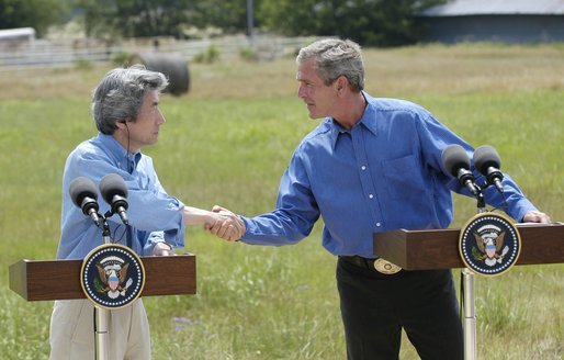 President George W. Bush and Japanese Prime Minister Junichiro Koizumi shake hands before beginning a news conference at the President's ranch near Crawford, Texas, Friday morning, May 23, 2003. White House photo by Eric Draper
