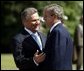 President George W. Bush and President of Poland Aleksander Kwasniewski talk during the President's trip to the Wawel Royal Palace in Krakow, Poland, Saturday, May 31, 2003. White House photo by Paul Morse