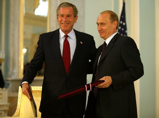 President George W. Bush and Russian President Vladimir Putin after exchanging documents of ratification inside the Konstantin Palace after a private meeting in St. Petersburg, Russia, June 1, 2003. White House photo by Paul Morse