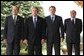 President George W. Bush poses with G8 leaders during the G8 Summit in Evian, France, Monday, June 2, 2003. From left, President Jacques Chirac of France, President Bush, Prime Minister Tony Blair of Great Britain and Prime Minister Silvio Berlusconi of Italy.  White House photo by Eric Draper