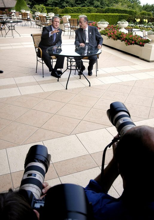 President George W. Bush speaks to the media with French President Jacques Chirac of France at the G8 Summit in Evian, France, Monday, June 2, 2003. White House photo by Eric Draper.