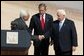 Palestinian Prime Minister Mahmoud Abbas, President George W. Bush and Israeli Prime Minister Ariel Sharon after reading statement to the press during the closing moments of the Red Sea Summit in Aqaba, Jordan Jun 4, 2003. White House photo by Paul Morse
