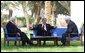 President George W. Bush, center, discusses the Middle East peace process with Prime Minister Ariel Sharon of Israel, left, and Palestinian Prime Minister Mahmoud Abbas in Aqaba, Jordan, Wednesday, June 4, 2003.   White House photo by Paul Morse