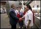 President George W. Bush greets employees of Andrea Foods in Orange, N.J., Monday, June 16, 2003. White House photo by Eric Draper